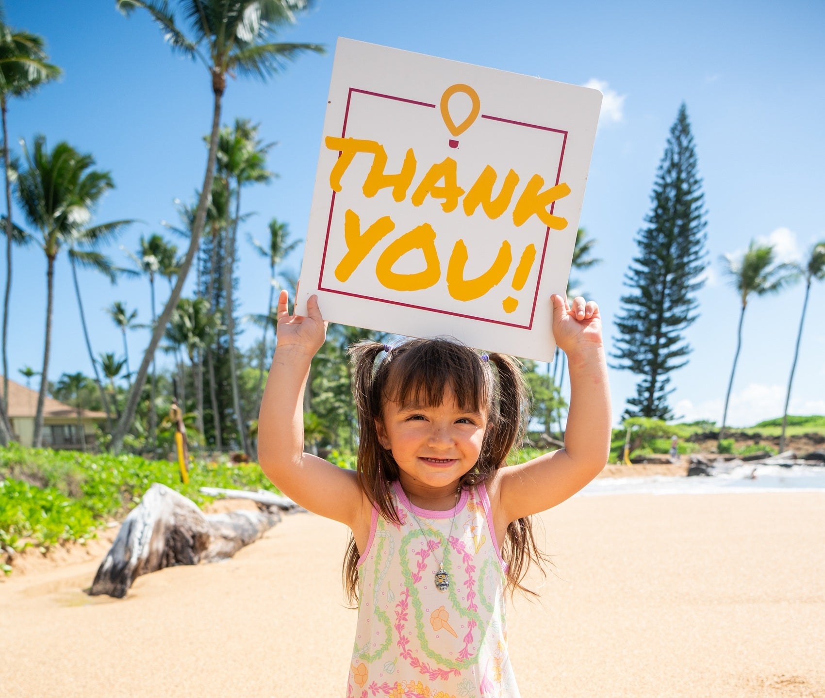 Seeley Borges with Thank You Sign