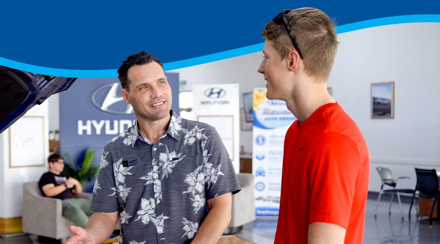 Customers Viewing Vehicle